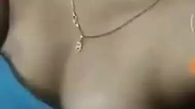 Girl with Indian features takes bra off exposing her boobs in sex show