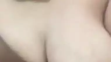 Pleasant Indian girl squeezes left breast and it also can be called porn