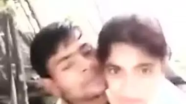 Beautiful Desi teen kisses her XXX lover on camera in the fresh air