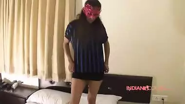 Indian girl with red mask takes XXX poses to tempt young man into sex
