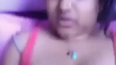 Woman from India acts like a webcam model when she has nothing to do