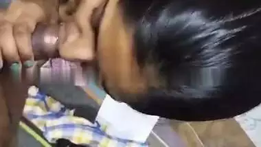 Cute girlfriend in bra giving blowjob to boyfriend