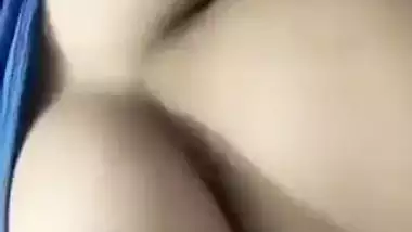 Beautiful desi girl lifting top to reveal sexy boobs