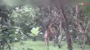 Two hot and sexy Desi aunty bathing in a outdoor under rain together