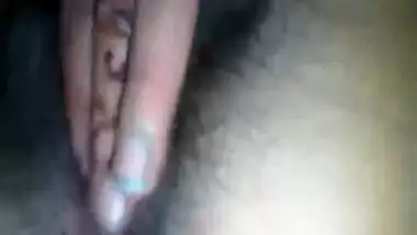 Desi female with sex boobs films her own XXX hole spreading the legs