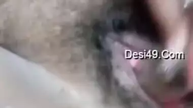 Fat Indian aunty fucks her own hairy twat with the new sex toy