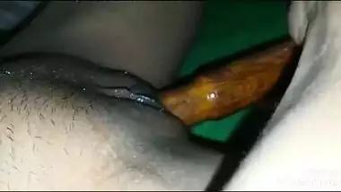 Indian MILF plays sex games with a XXX rolling pin in her sex hole