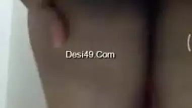 During video call amateur Desi girl with big XXX tits poses fully naked