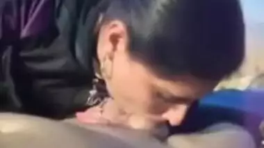 Beauty giving a BJ
